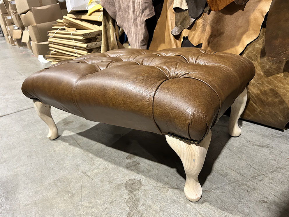 Tan leather footstool